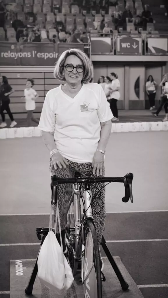 An ALGSO member on a bicycle at the Relais pour la Vie 2025 Luxembourg